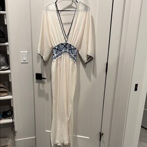 Elegant Cream Dress with Blue Accents